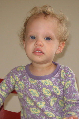 Donna in purple pajamas