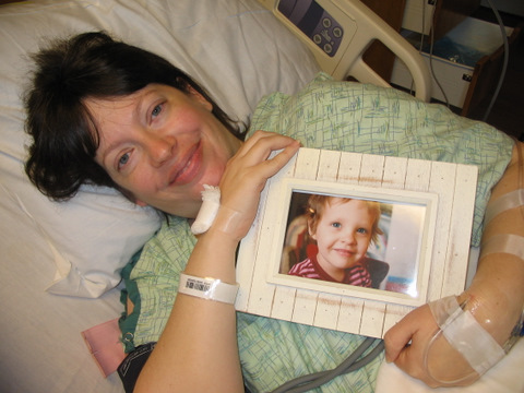 Mama holding photo of Donna