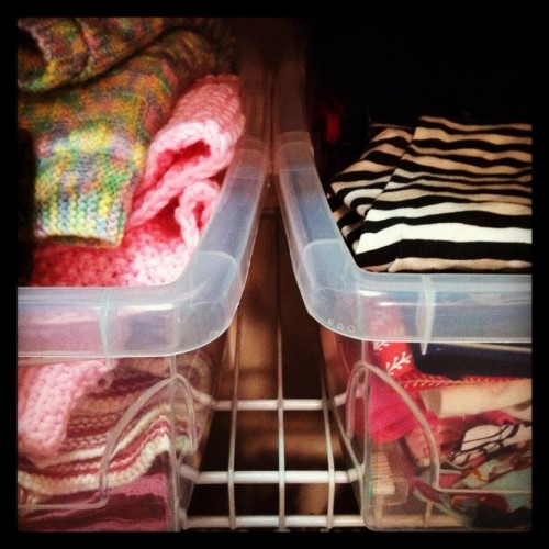 These are a few of her favorite things.  Stacked in big bins, never to be worn again.