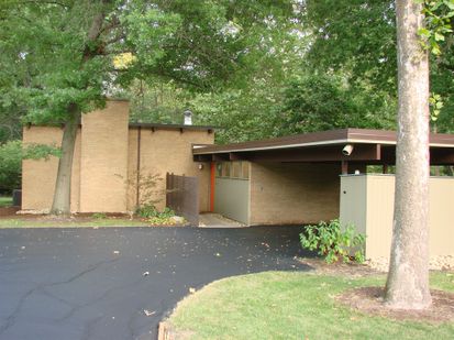 Sometimes, just for kicks, I look at what our city housing dollar could buy in the suburbs.  Like this ridiculously cool ranch surrounded by so much nature and outfitted with floor to ceiling windows so you can actually see the nature.  Ah, yes, location, location, location . . . This one is currently available in Olympia Fields, Illinois for a song and a dance.  It's pretty much my version of the Barbie Dream Home.