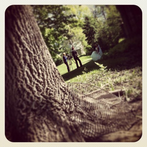 Eye spy a bride and groom on a beautiful spring day.  Oh, yes, and an abandoned barbecue grill, too!