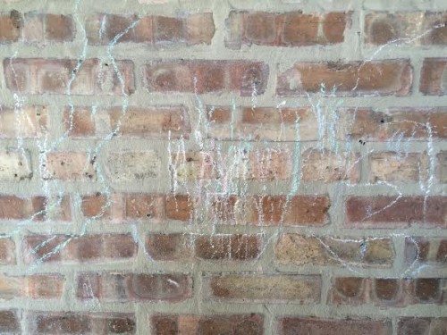 Kyler's chalk art on the side of the author's home.  