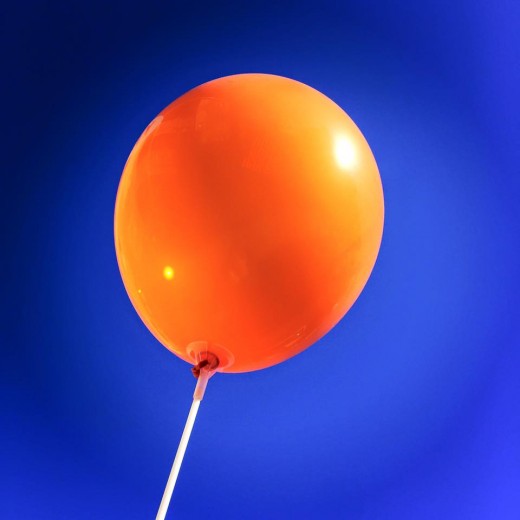 Today's orange balloon, which looks so much like that other orange balloon.  The bright blue skies are the same, too.  It is for Donna, and her brother, a small connection.