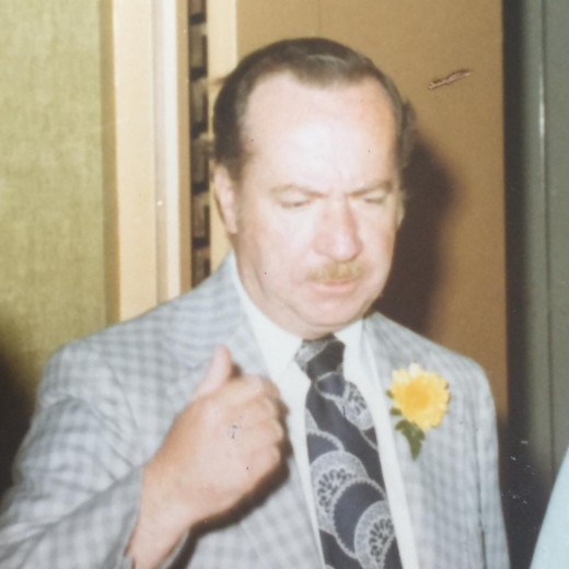 I'm not certain where this photo was taken of my Dad, but I recognize his expression.  He is unhappy, eyebrows raised, gesturing.  No doubt, he had just been told something he did not like.  Lord, did he buck authority.